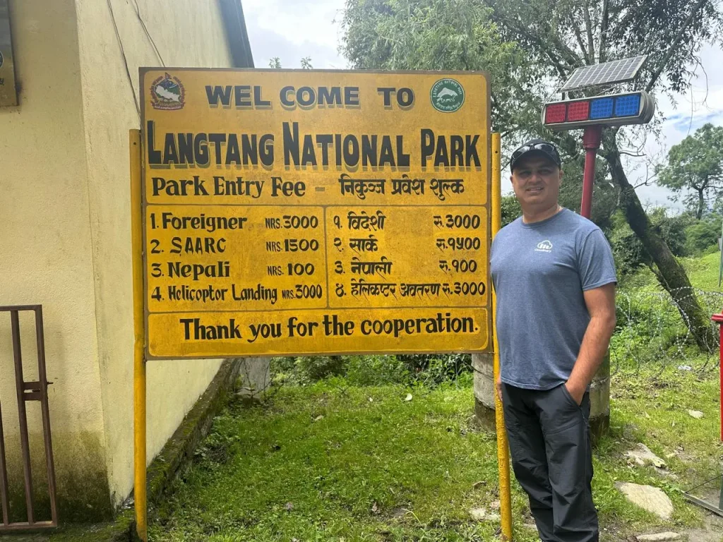 Langtang National Park entrance signboard with park entry fee information in Nepal.