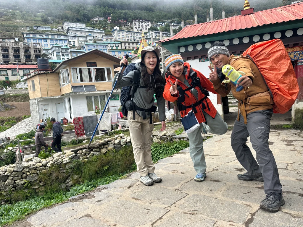 Trekkers posing in Namche Bazaar, Everest region, Nepal
