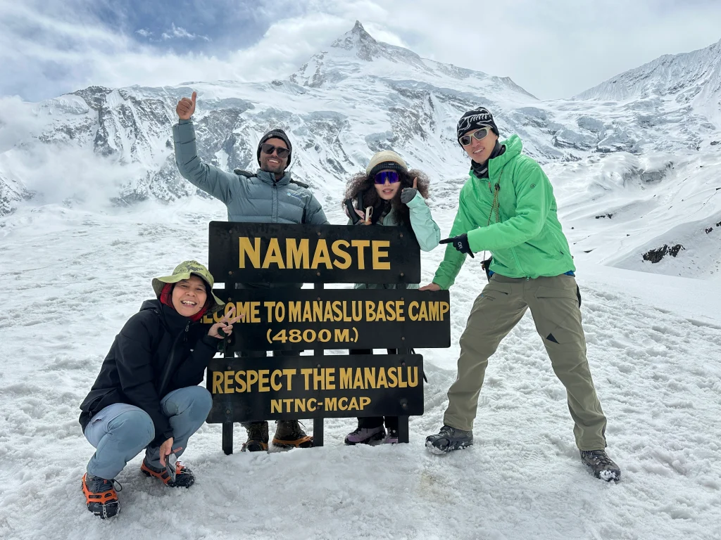 Trekkers reaching Manaslu Base Camp at 4,800.